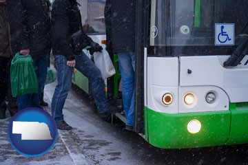 commuters boarding a city bus - with Nebraska icon